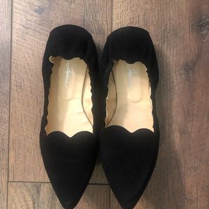 Isa Tapia black suede flats